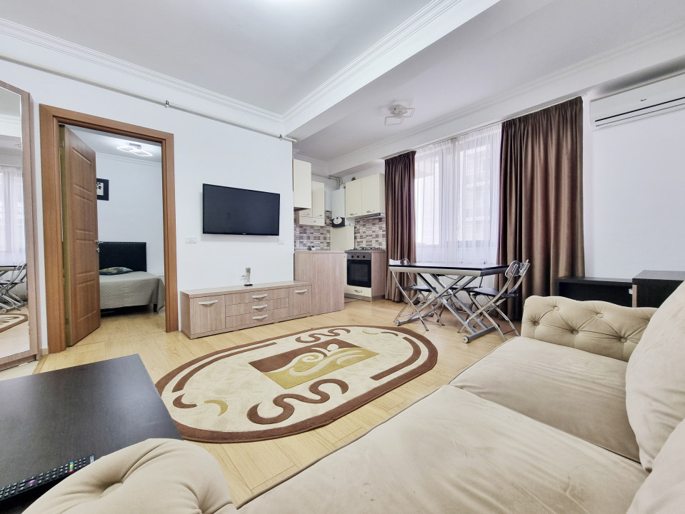 Apartament cu parcare privata si vedere catre lac in centrul statiunii