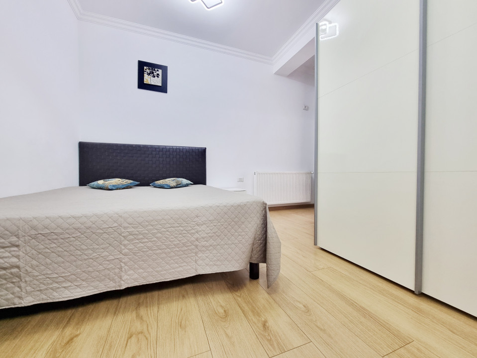 Apartament cu parcare privata si vedere catre lac in centrul statiunii