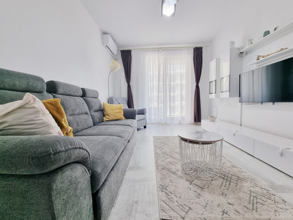 Apartament in bloc cu parcare privata, langa plaja
