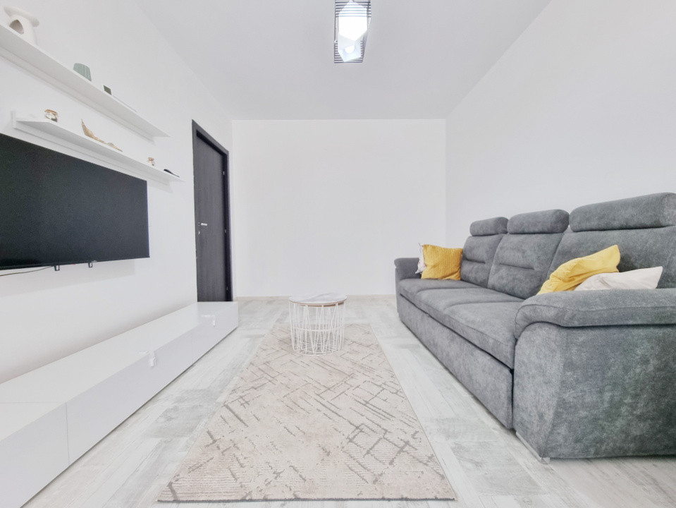 Apartament in bloc cu parcare privata, langa plaja