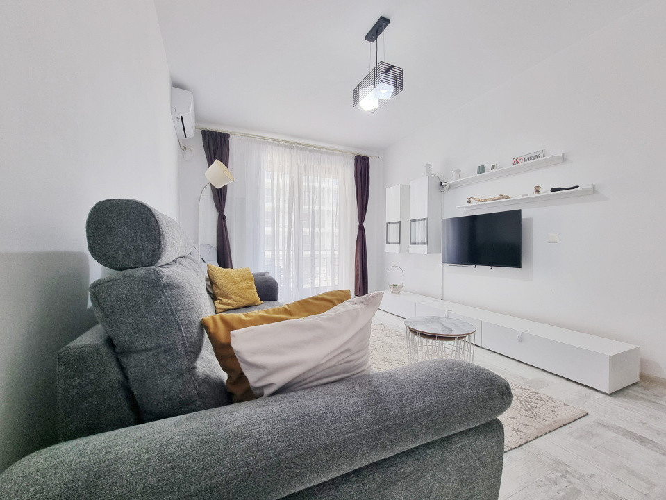 Apartament in bloc cu parcare privata, langa plaja