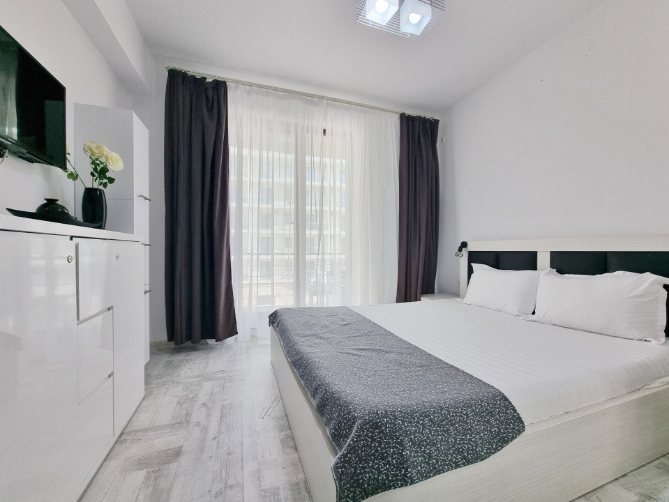 Apartament in bloc cu parcare privata, langa plaja