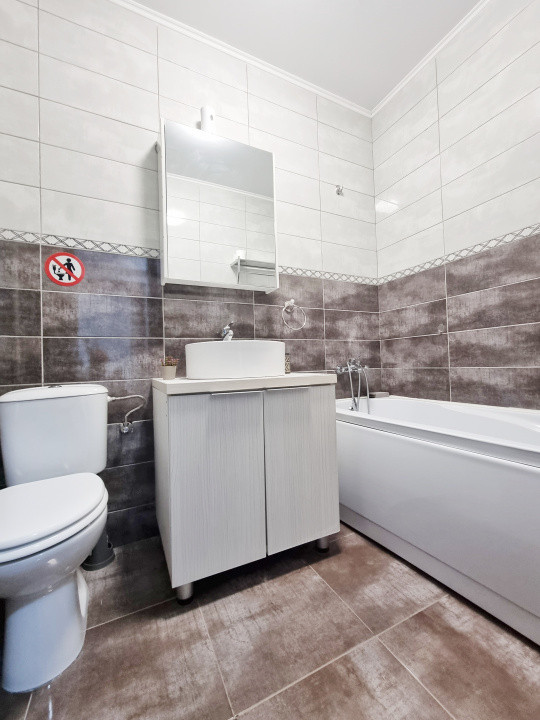 Apartament in bloc cu parcare privata, langa plaja